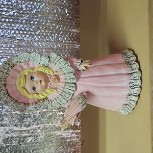 Vintage Gare mold ceramic blonde girl in a bonnet with a doll